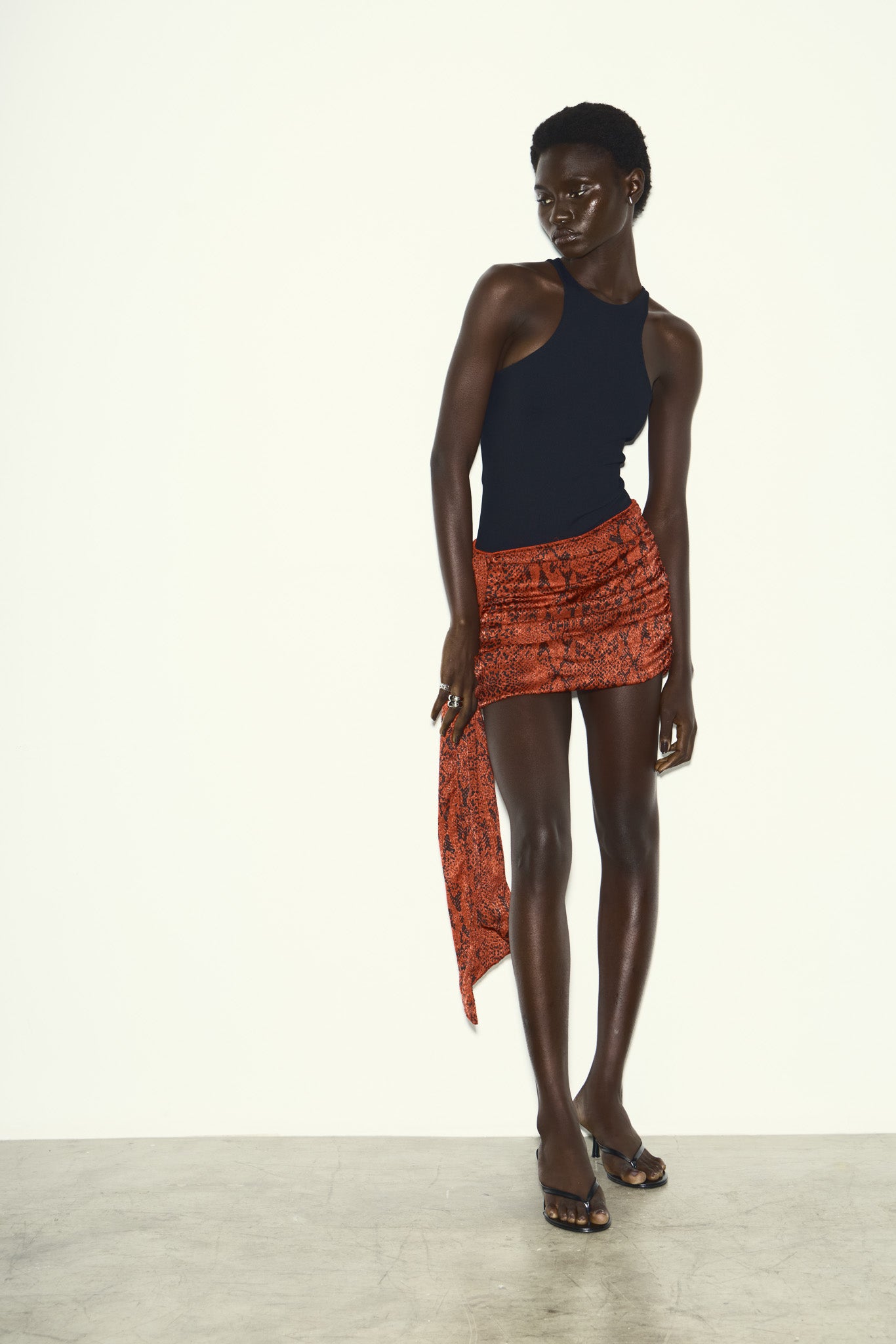 SAIA VERMELHA ESTAMPADA